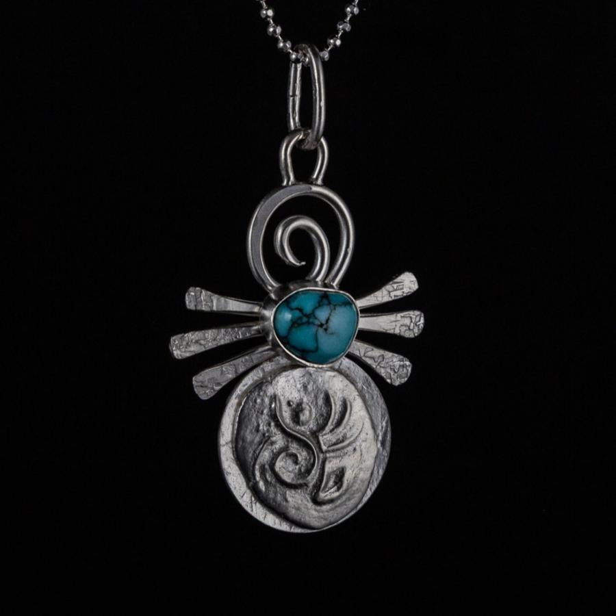 Silver pendant with turquoise stone