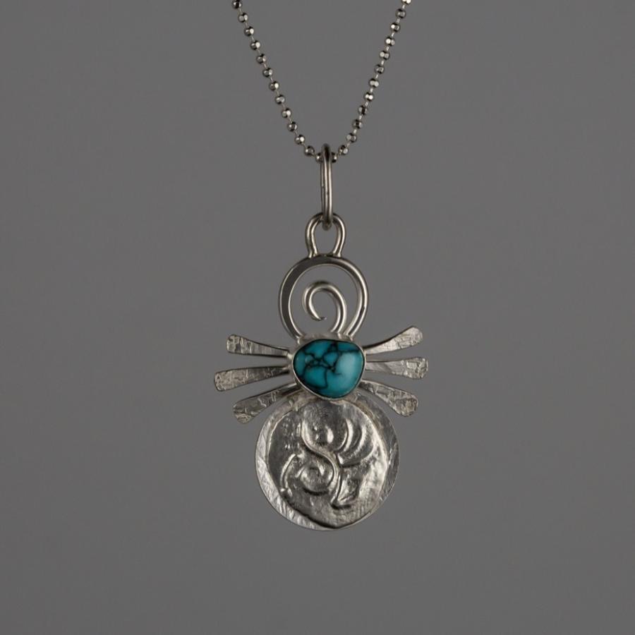 Silver pendant with turquoise stone