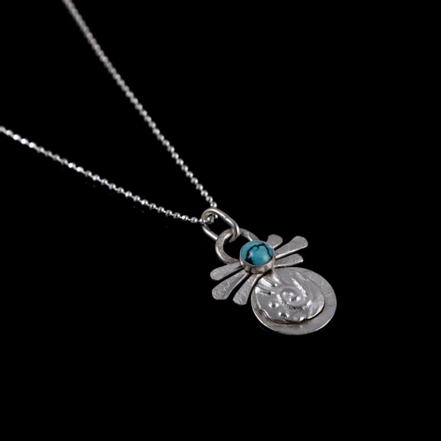 Silver pendant with turquoise stone
