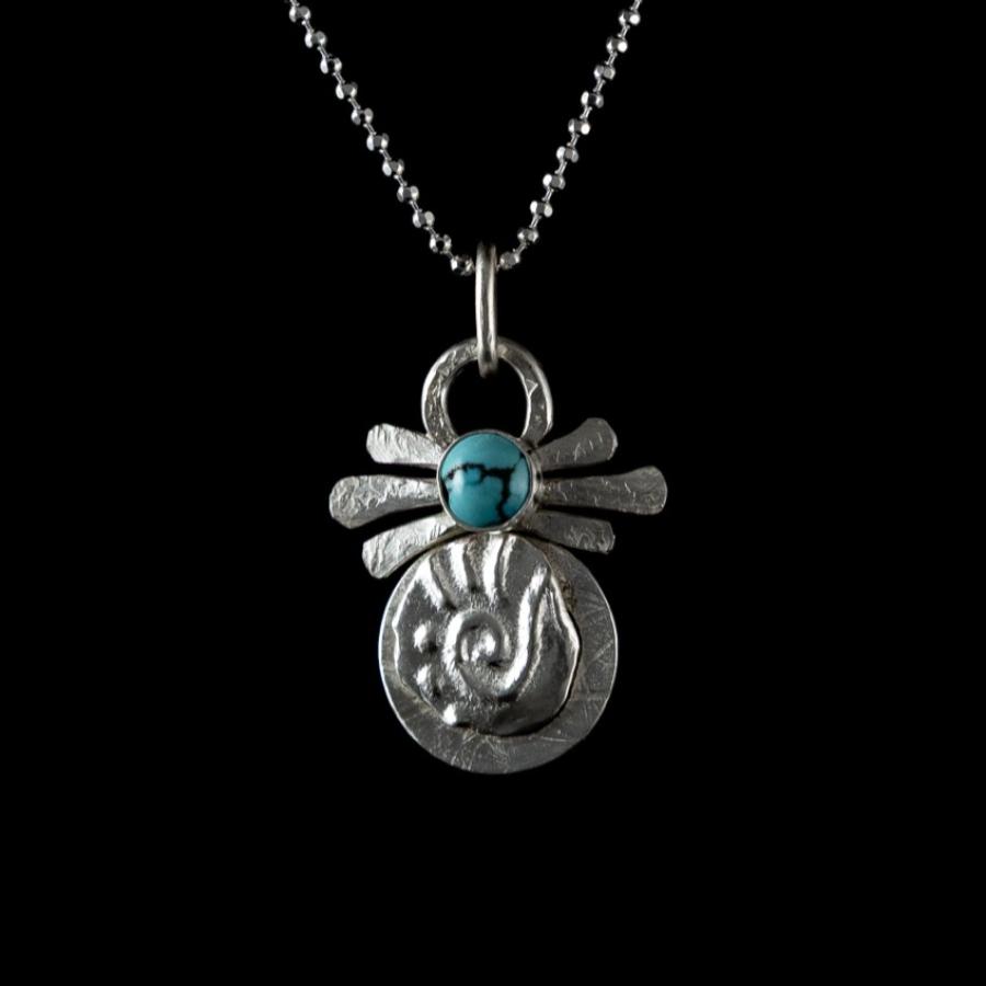 Silver pendant with turquoise stone