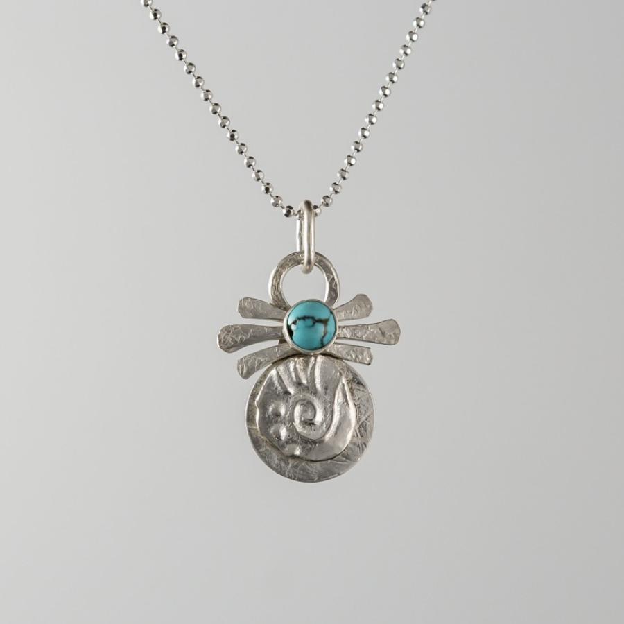 Silver pendant with turquoise stone