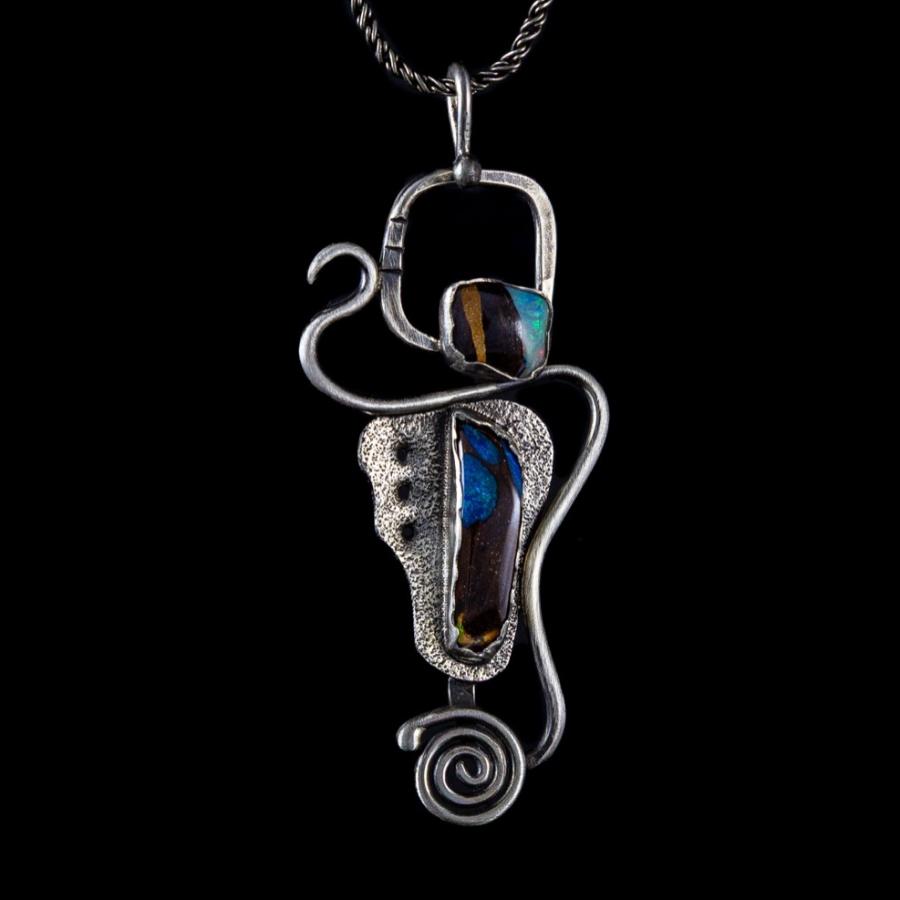 Silver pendant with bolder opal