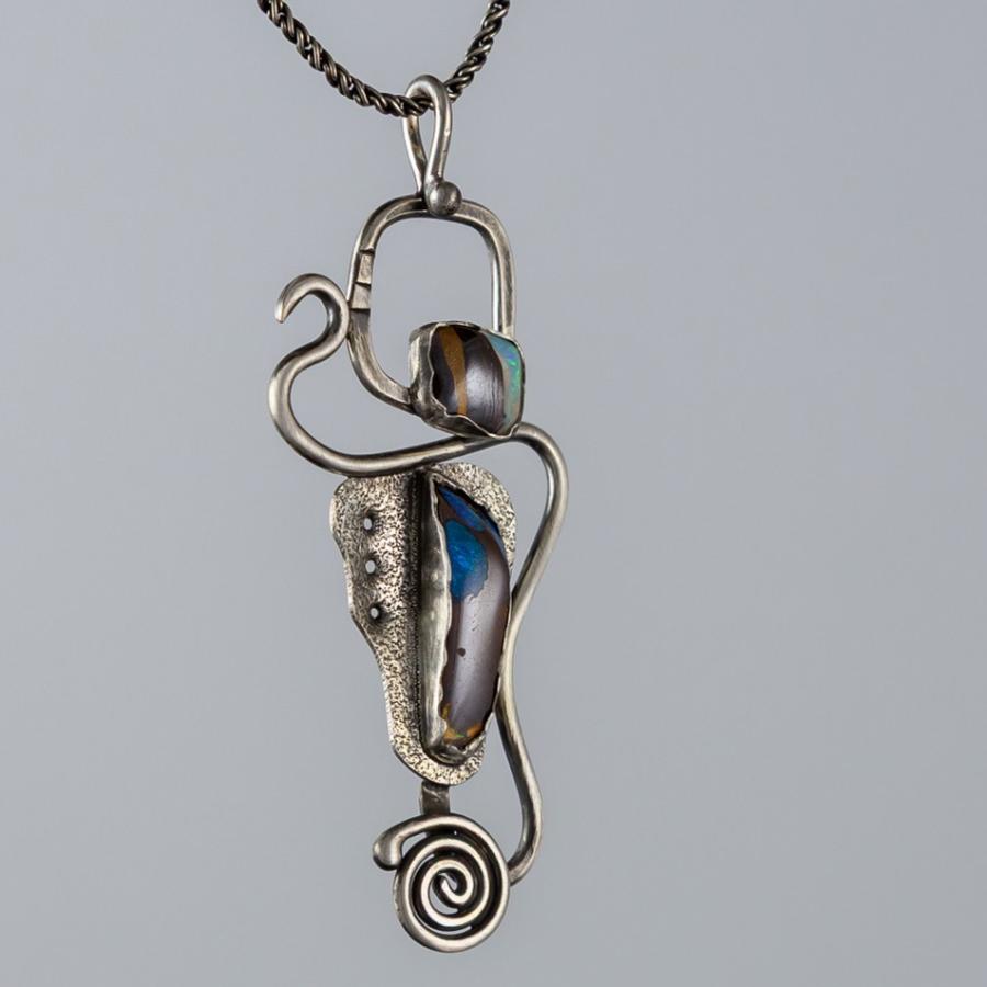 Silver pendant with bolder opal