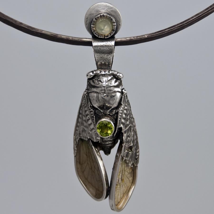 Silver cicada pendant necklace.