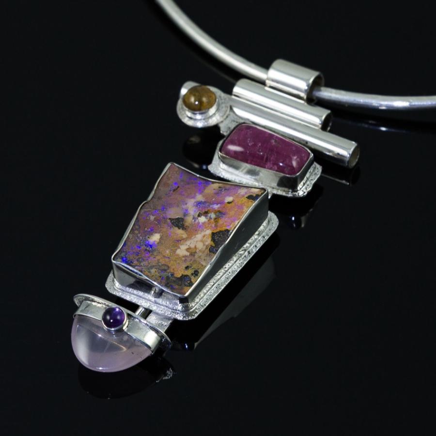 Handmade opal pendant necklace.