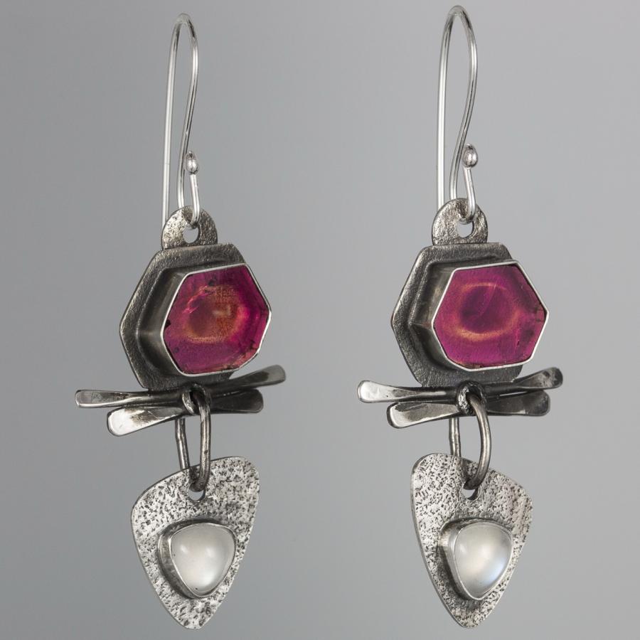 Dangle earrings with silver, pink, and white stones.
