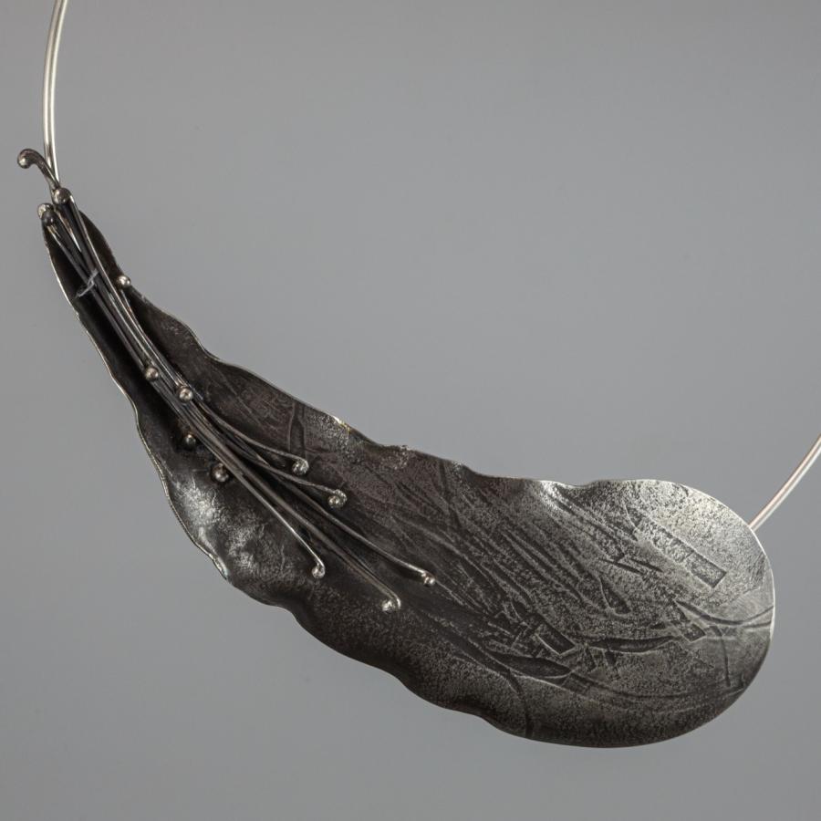 Silver leaf pendant.
