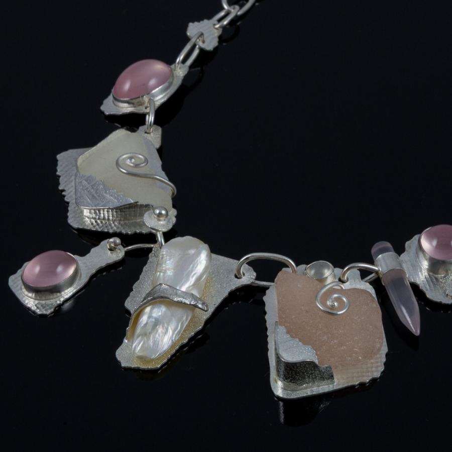 Necklace with pink stones and silver.