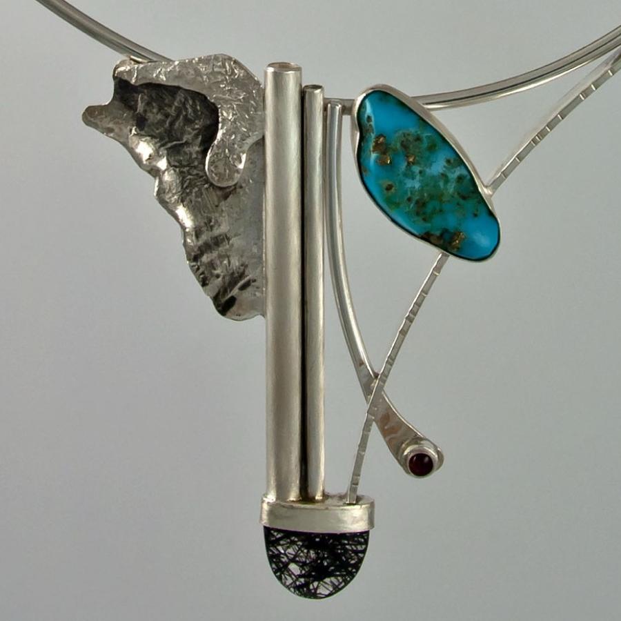 Handmade necklace with silver and turquoise.
