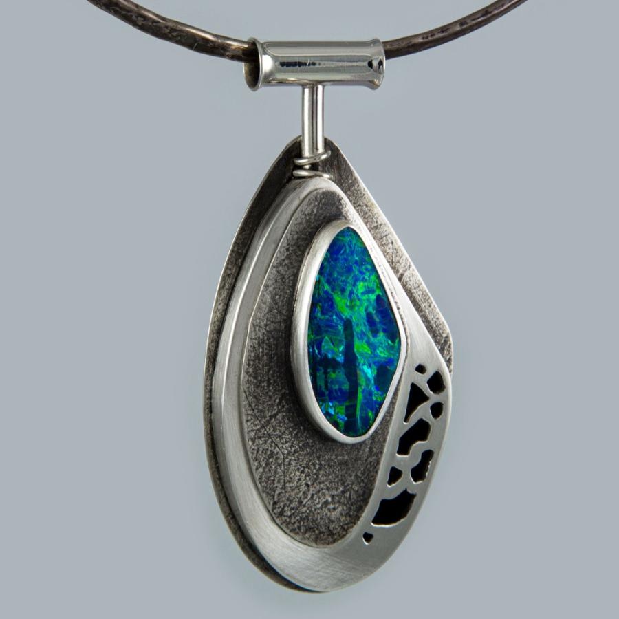 Necklace with teardrop pendant and blue opal.