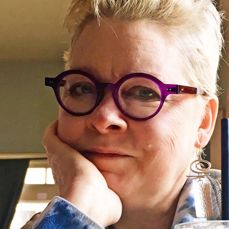 Picture of a woman wearing glasses