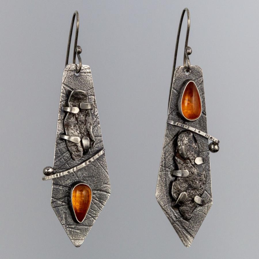 Silver earrings with yellow stone
