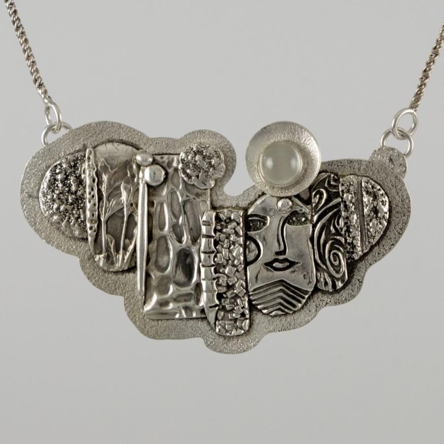 Sculptured silver pendant