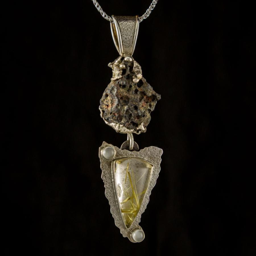 Unique silver pendant with multiple stones