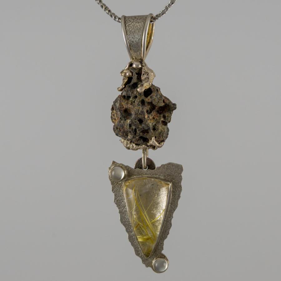 Unique silver pendant with multiple stones