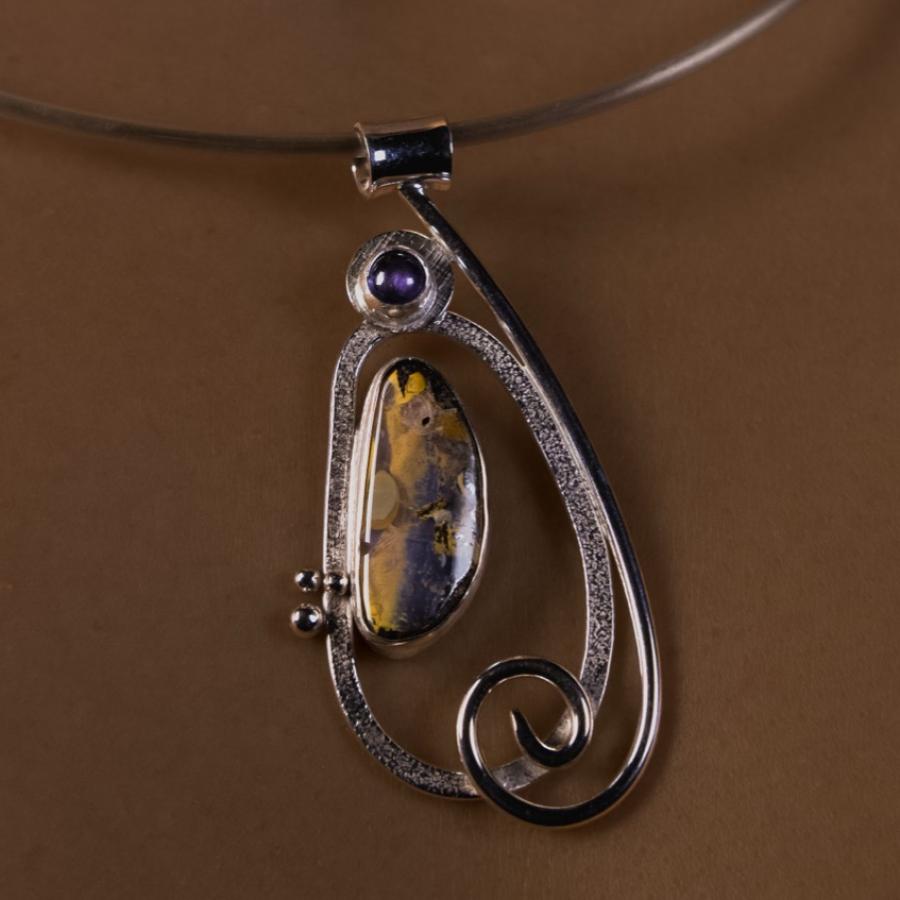Silver pendant with two stones