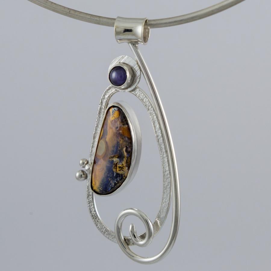 Silver pendant with two stones