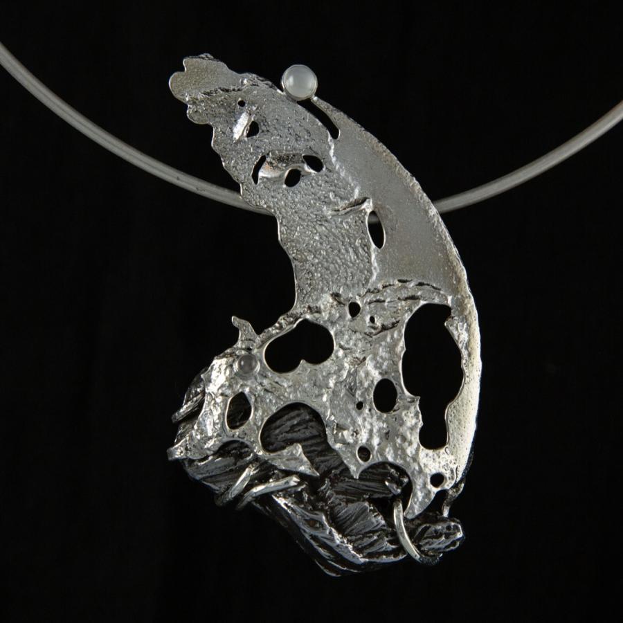Silver and meteorite pendant