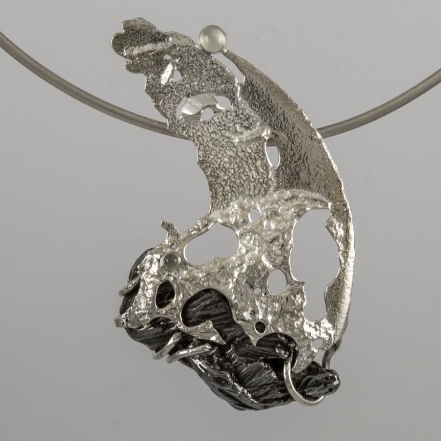 Silver and meteorite pendant