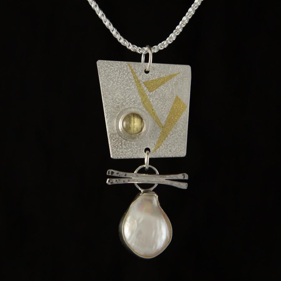 Silver and gold pendant with pearl and rutilated quartz