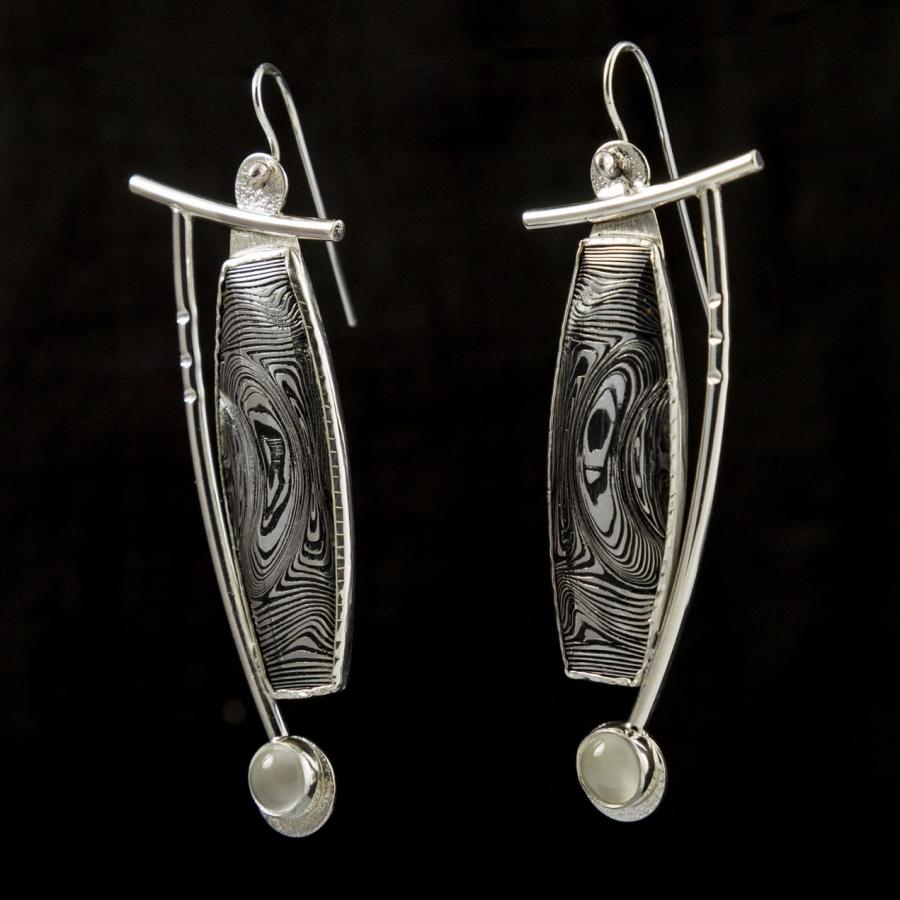 Silver and black earrings