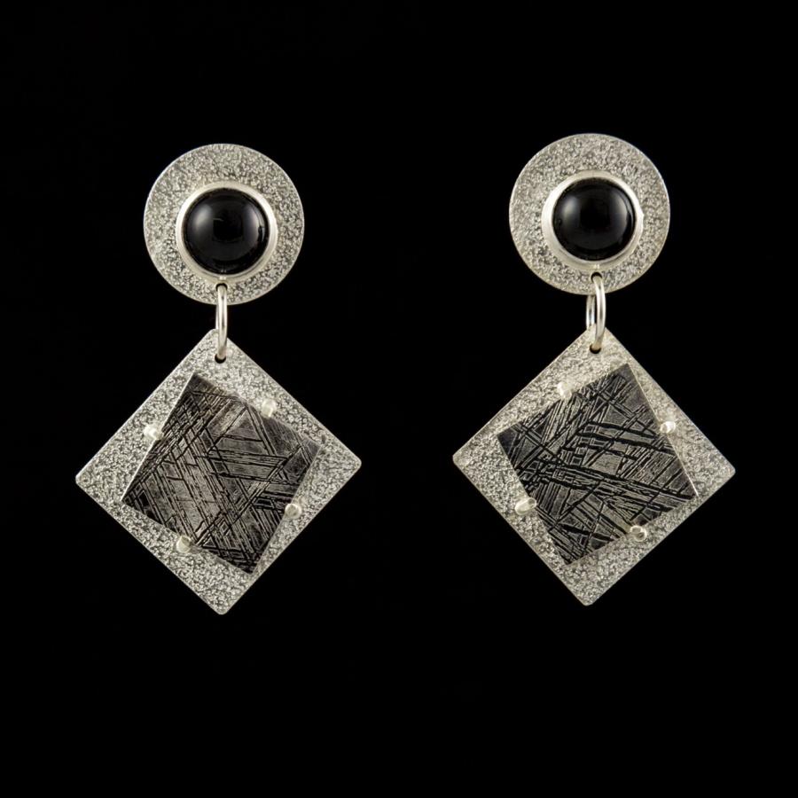 Silver earrings with black stones
