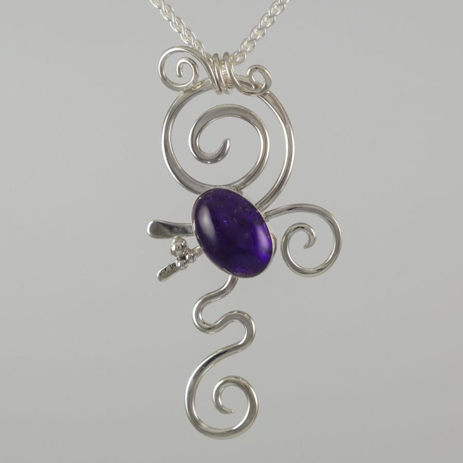 Silver pendant with purple stone