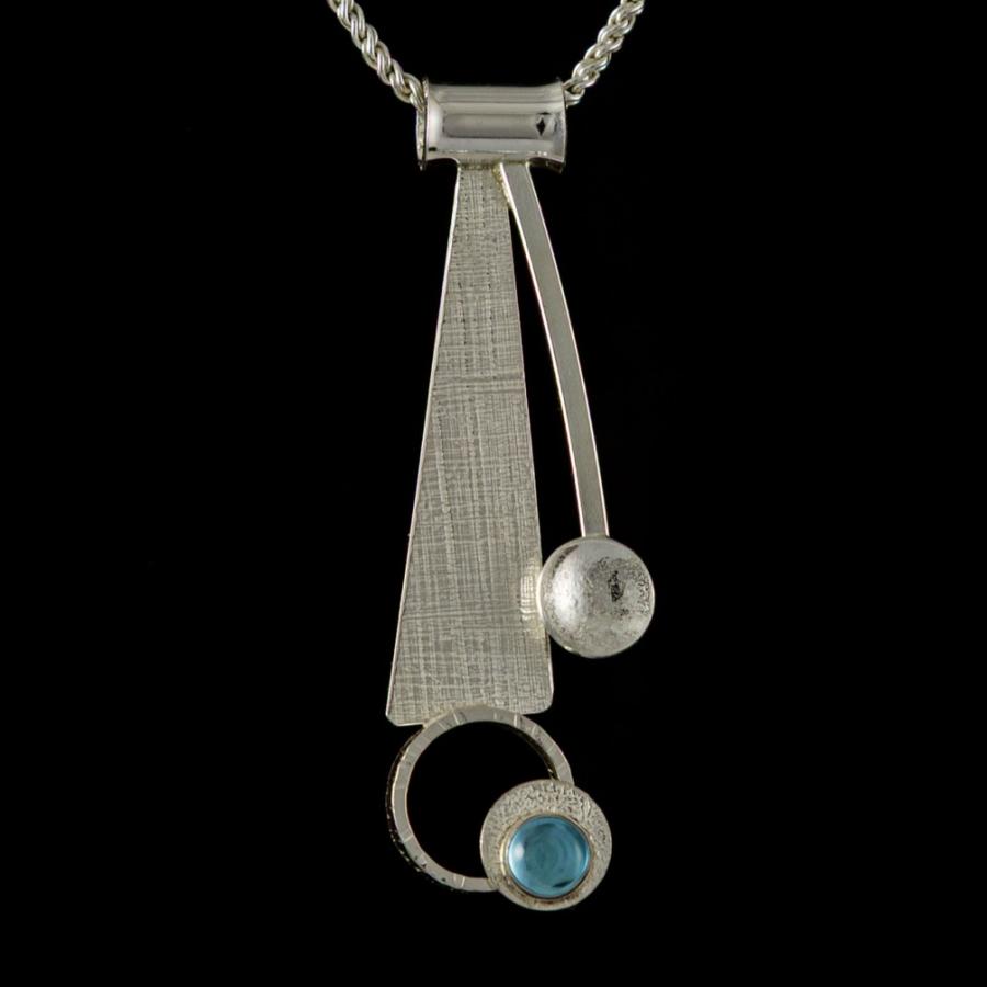 Silver pendant with a blue stone