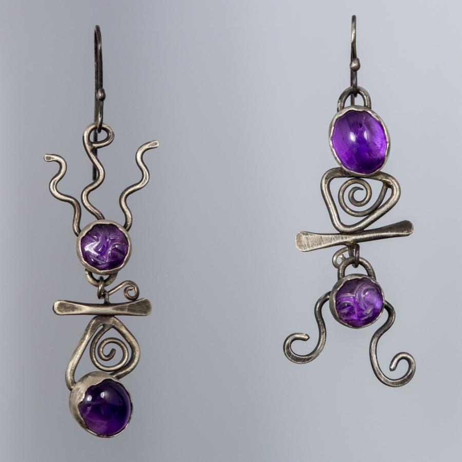 Earrings with purple stones