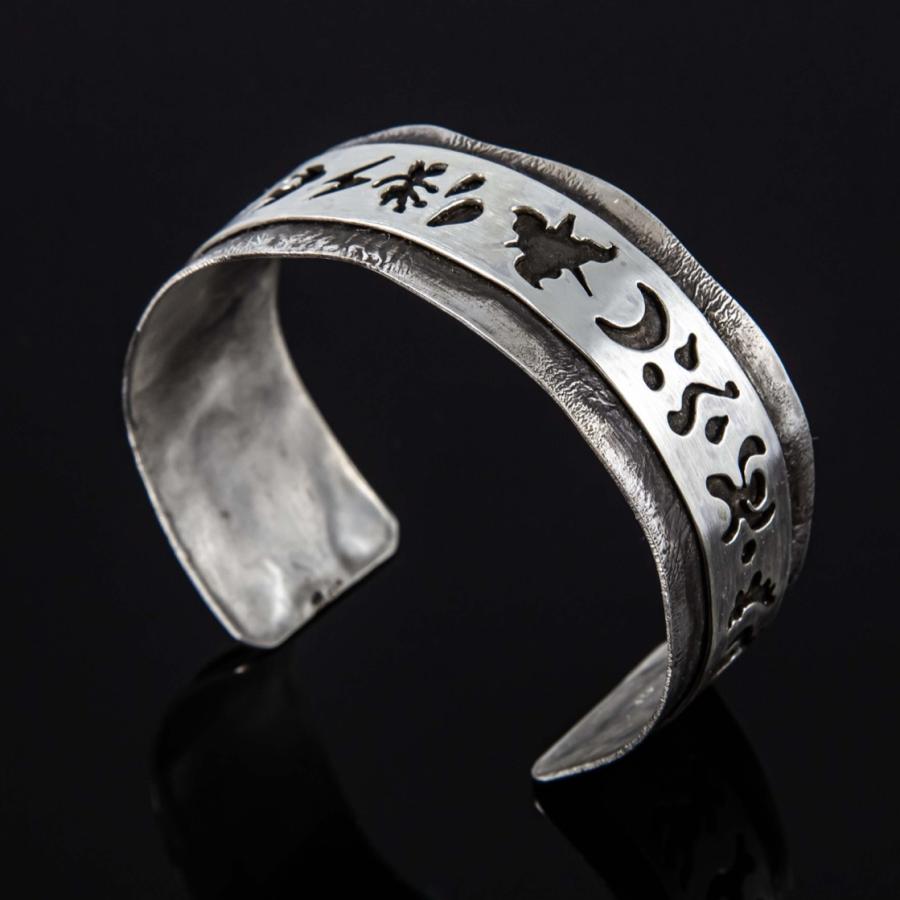 Silver bracelet with symbols