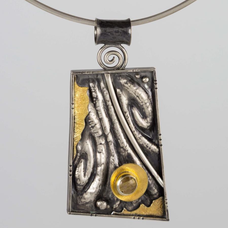Silver and gold pendant