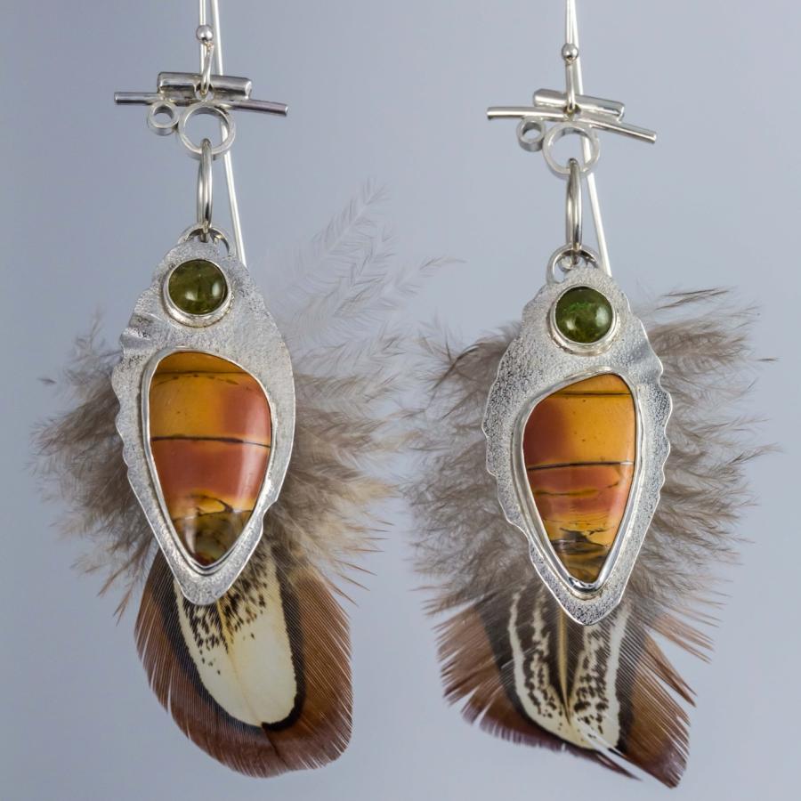 Silver earrings with colorful stones and feathers