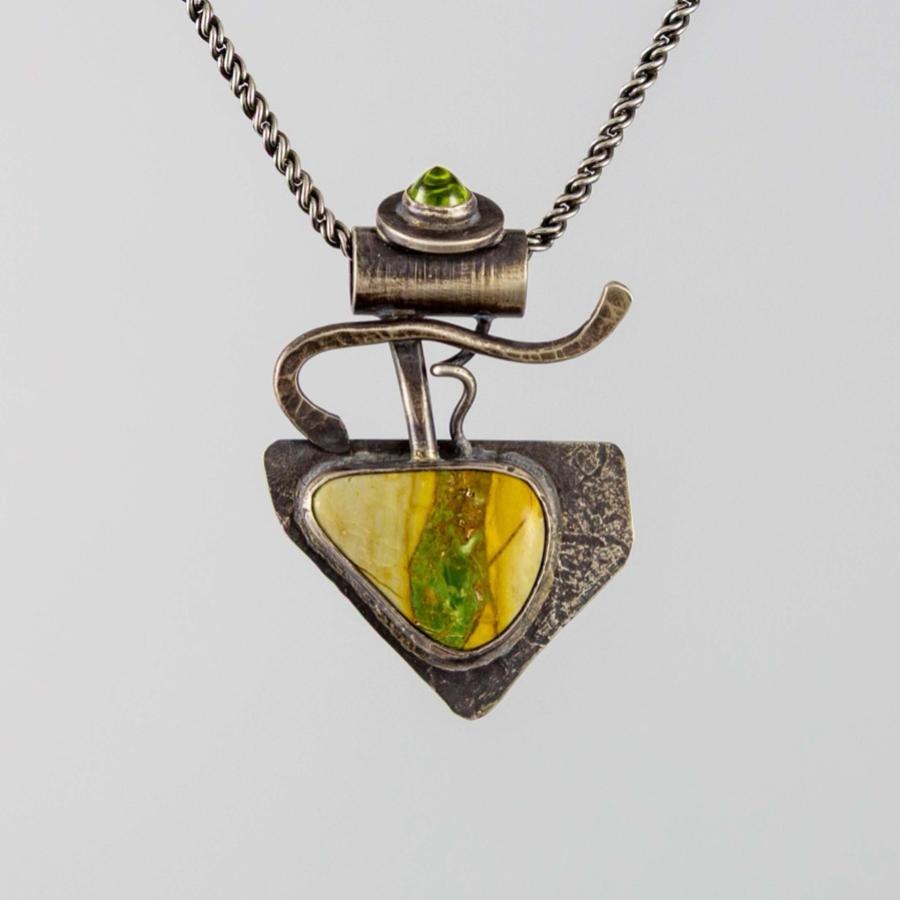 Silver pendant with green and yellow stones