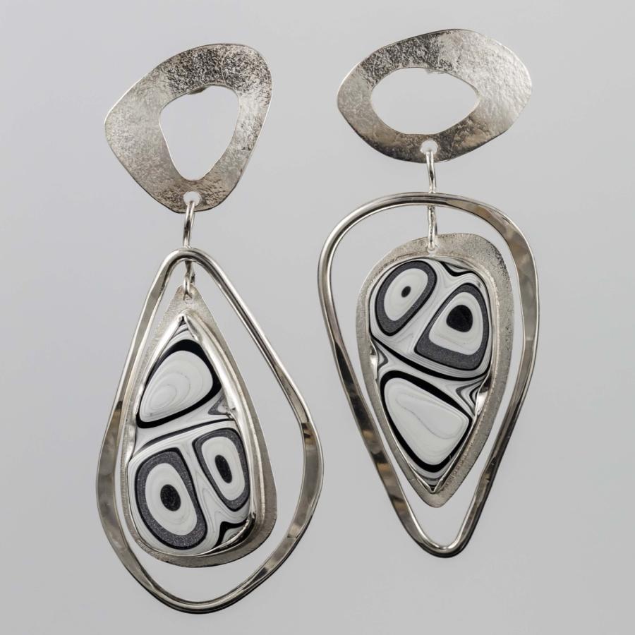 Silver earrings with black and white stones