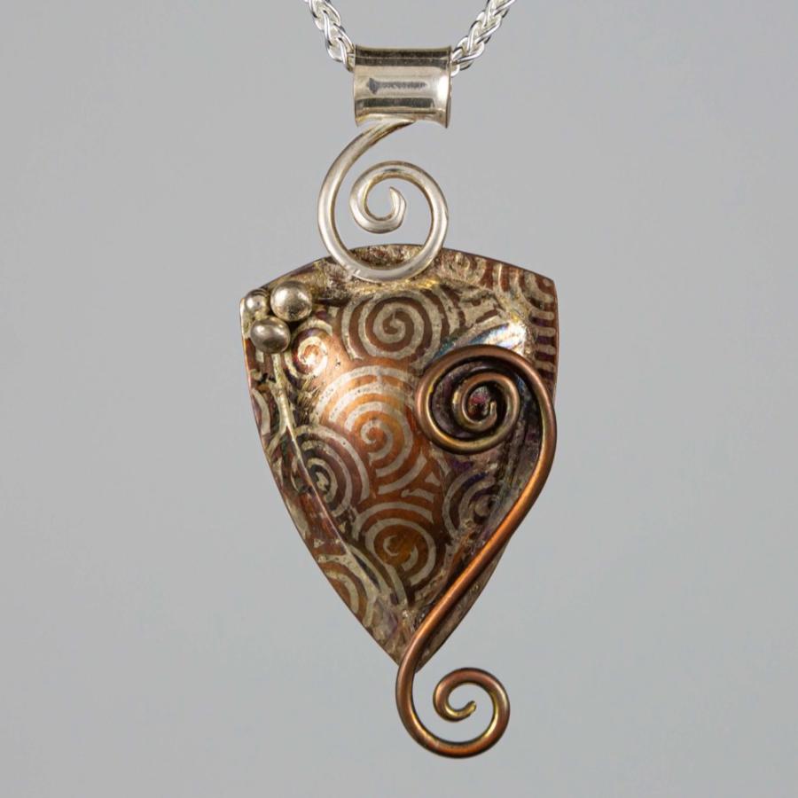 Silver and copper pendant