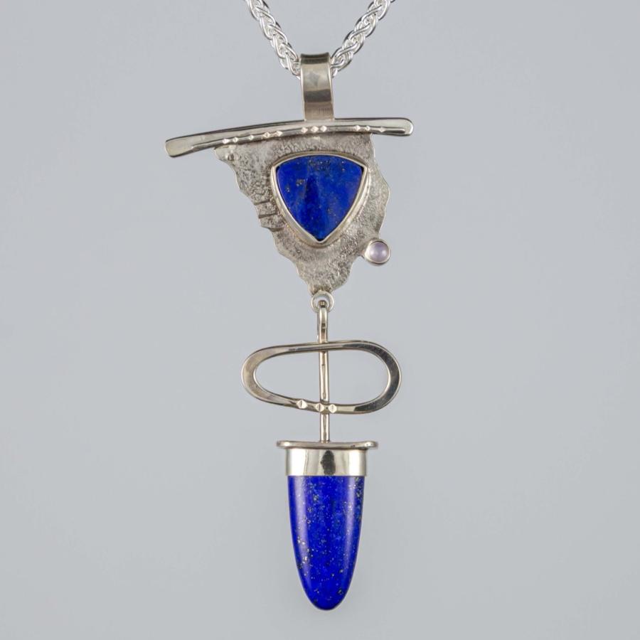 Silver pendant with blue stones