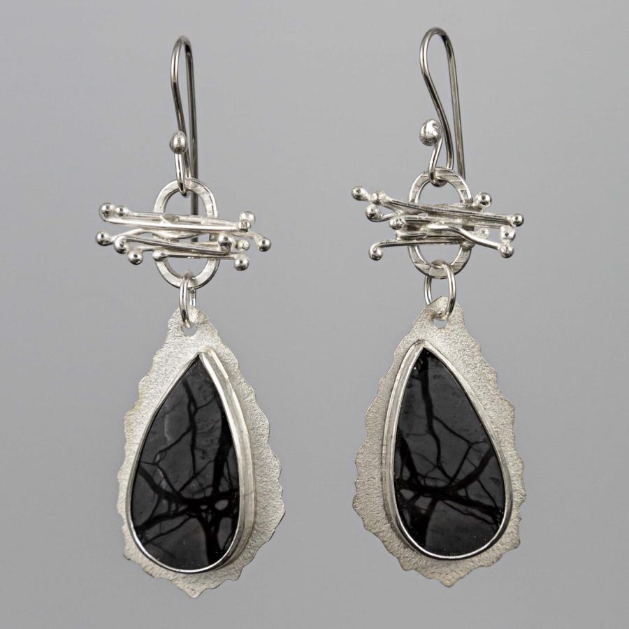 Silver earrings with black stones
