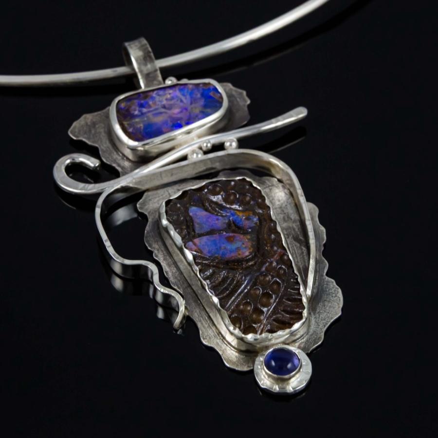 Silver pendant with two opals