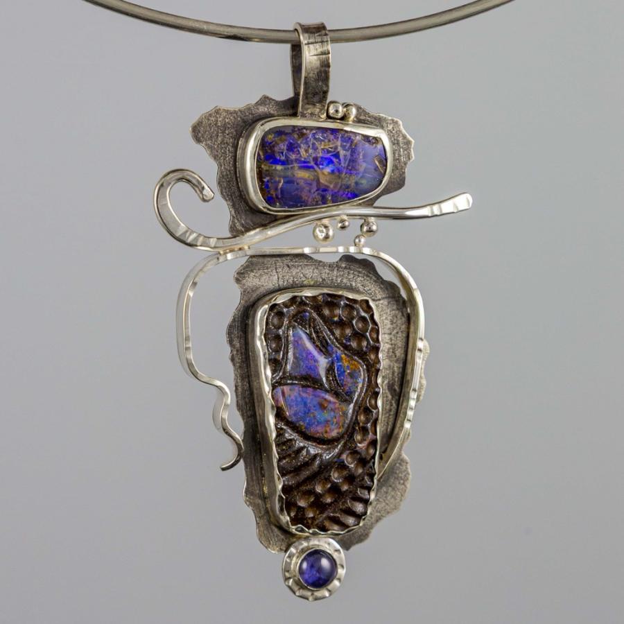 Silver pendant with two opals