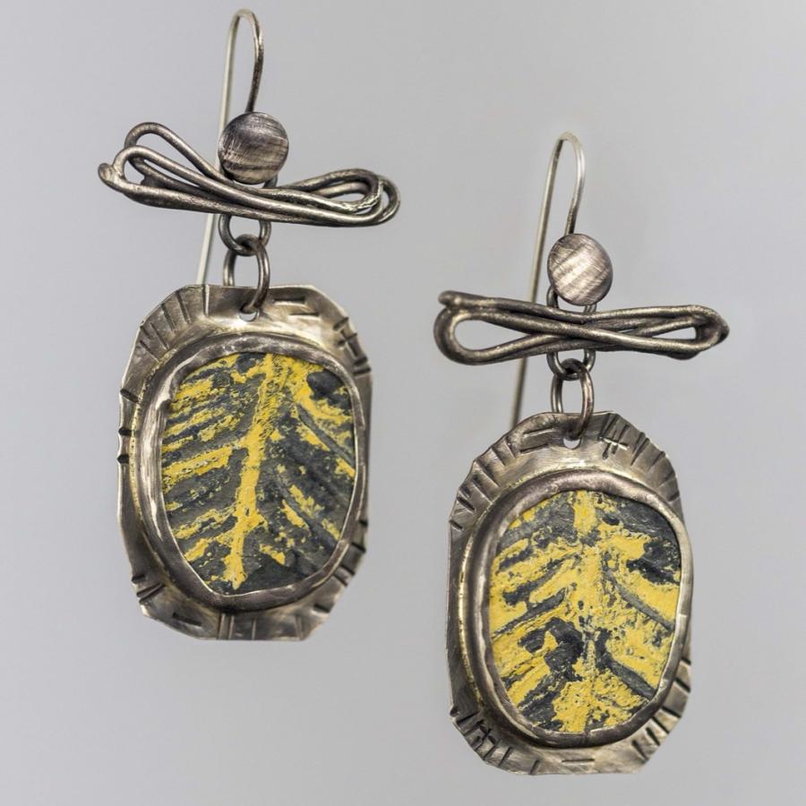 Silver earrings with yellow stones