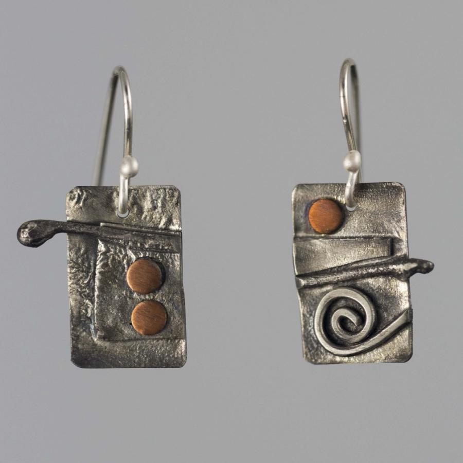 Silver earrings with copper accents