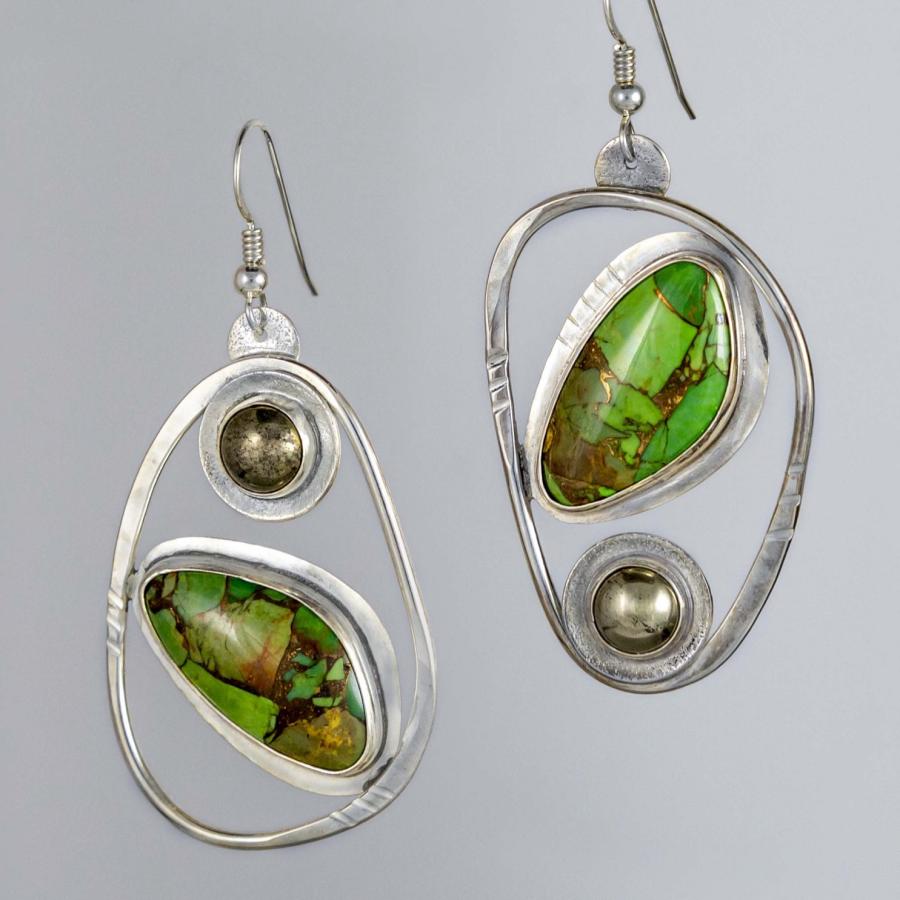 Pair of handcrafted silver drop earrings featuring green turquoise stones and metallic spheres.