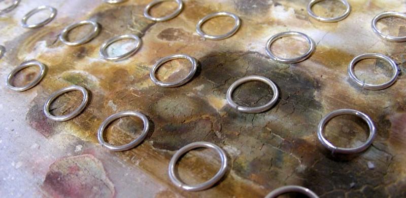 Rings for a chain waiting to be soldered.