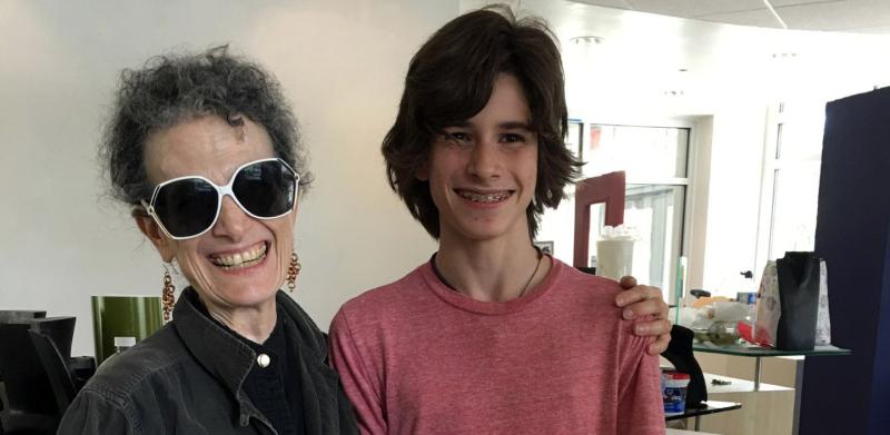 Ruth in sunglasses posing with Louis