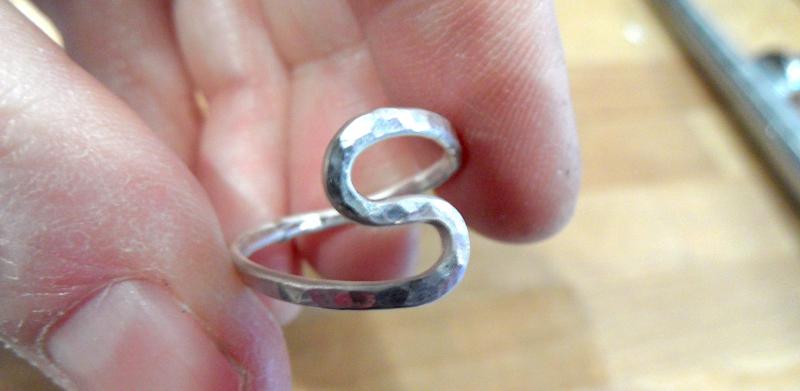 A sterling silver ring.