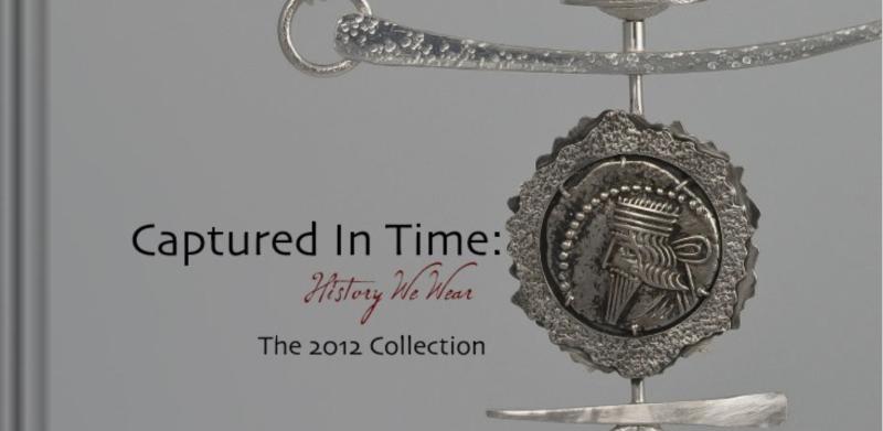 Necklace with coin pendant, jewelry photograph.