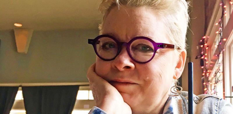 Picture of a woman wearing glasses