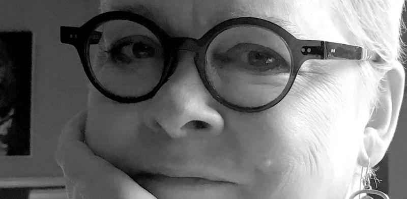 Picture of a woman wearing glasses