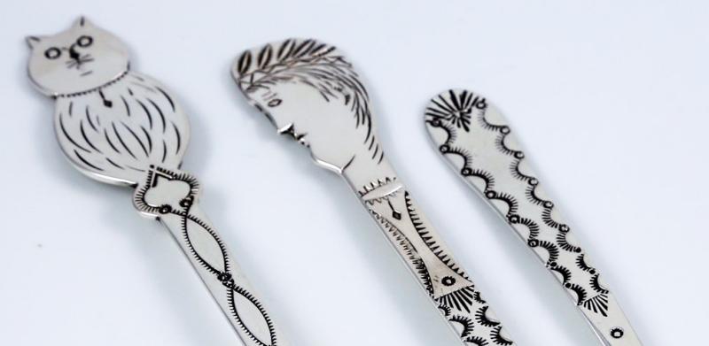 Three silver spoons
