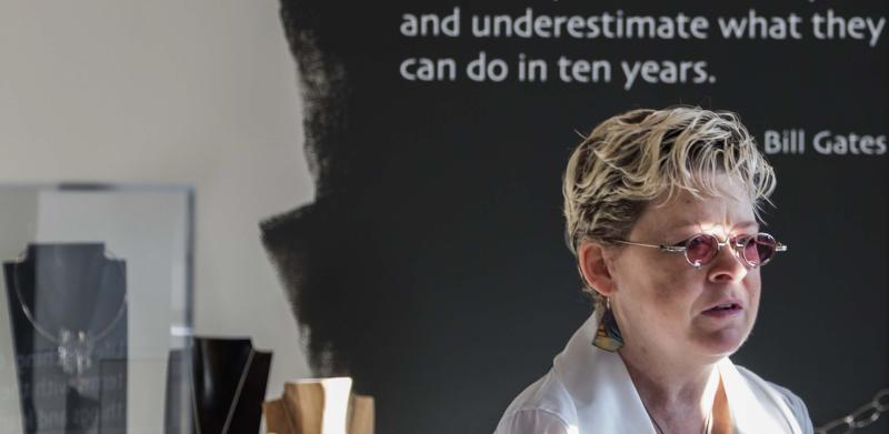 Woman with a quote by Bill Gates